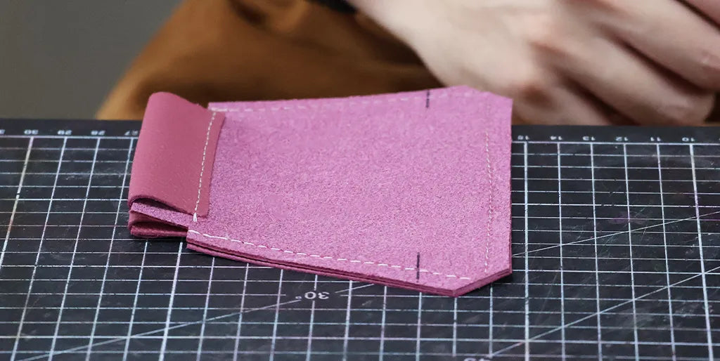 Cut the corners of the coin purse