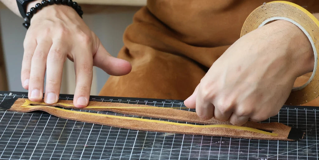 Coller la fermeture à glissière sur cuir