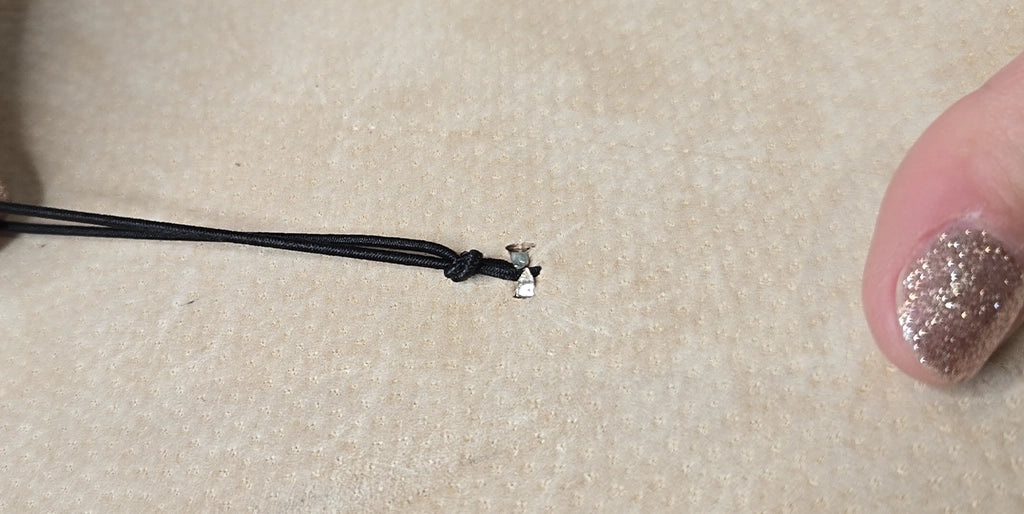 Fixer l'élastique