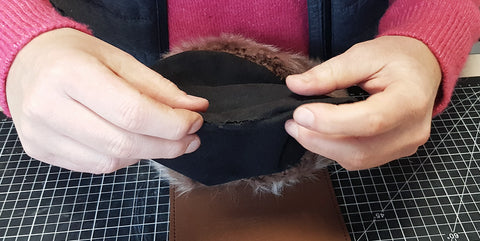 fermeture de la doublure du cuir