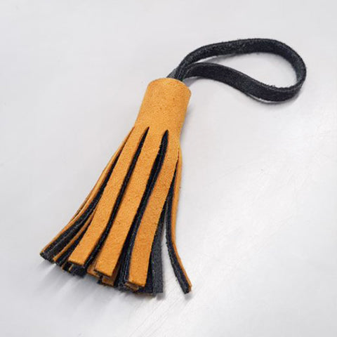 Pompon en cuir