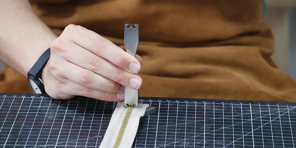 Enlever des dents de la fermeture