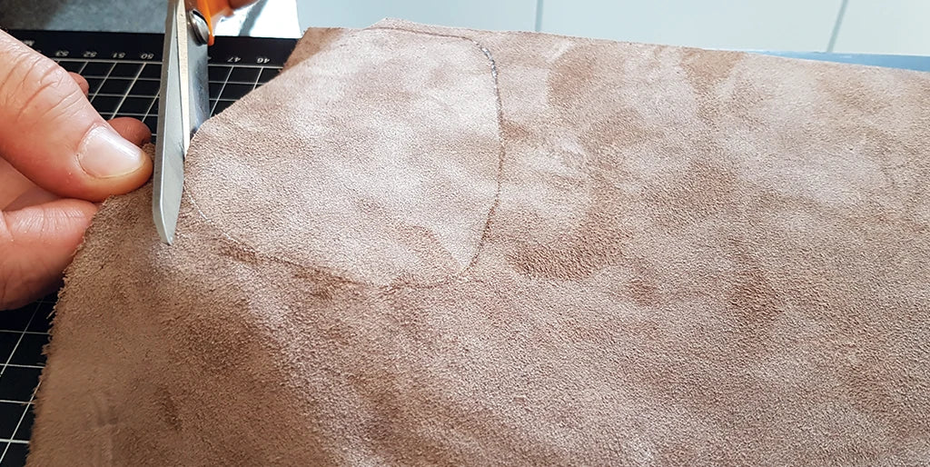 cut leather scraps for baby slippers
