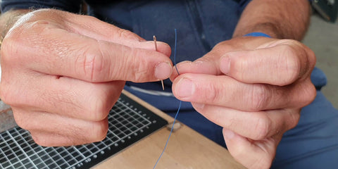 enfiler aiguille