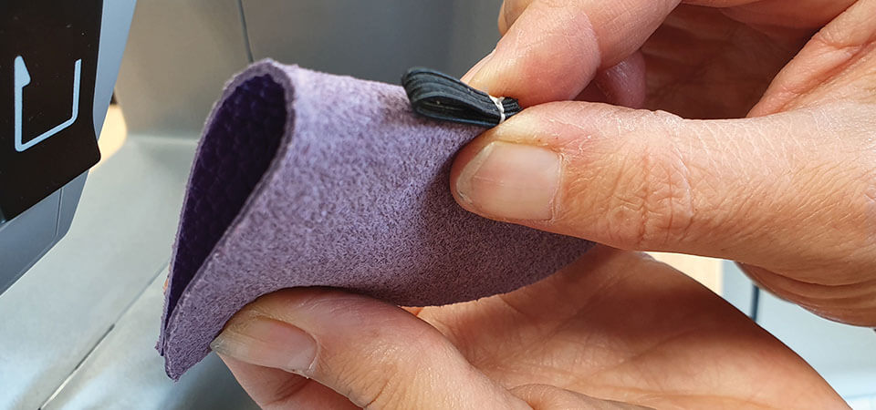 sewing tab on slipper upper