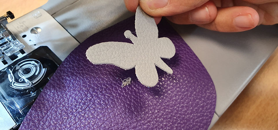 sew baby leather slipper motif